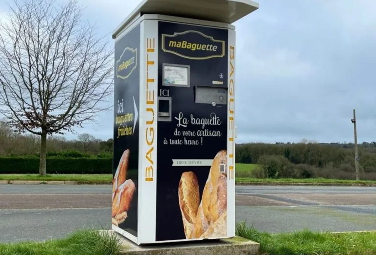 baguette vending machine near a road in France.