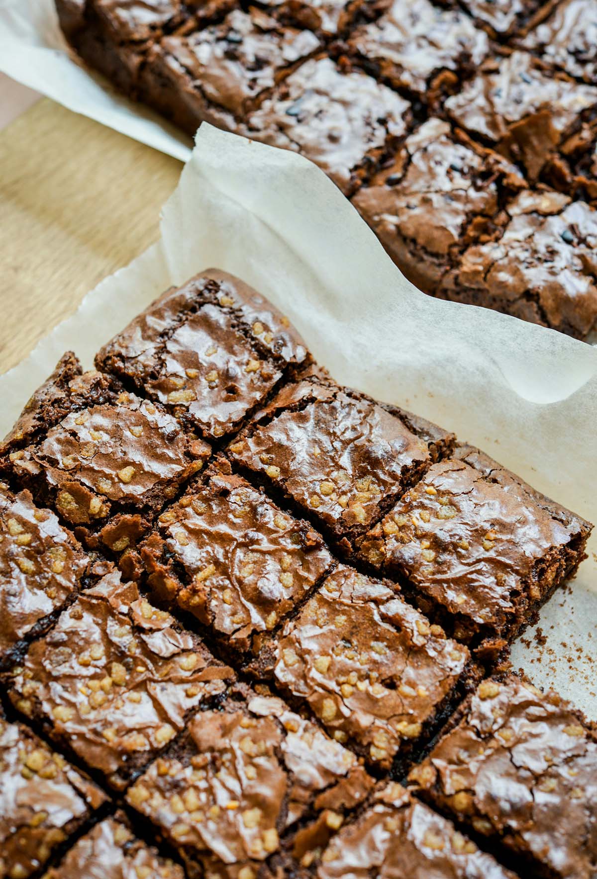 tray of nut brownies on parchment paper.