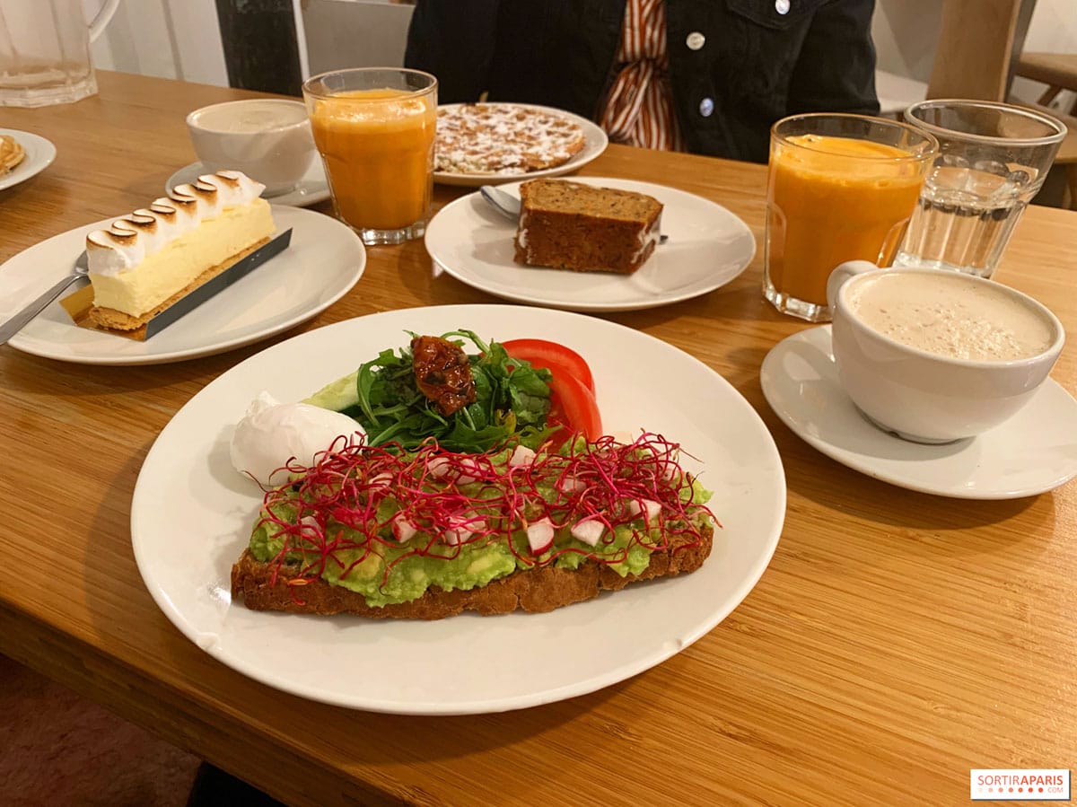 plates of waffles, open-faced sandwich, bread, and pastry.