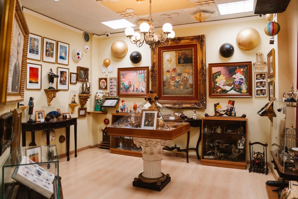 museum for kids and families with photos on the walls and artifacts on the floor.