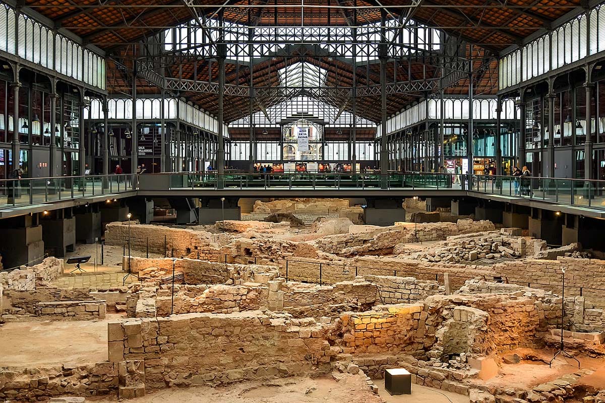 historic ruins in the center of a modern library.