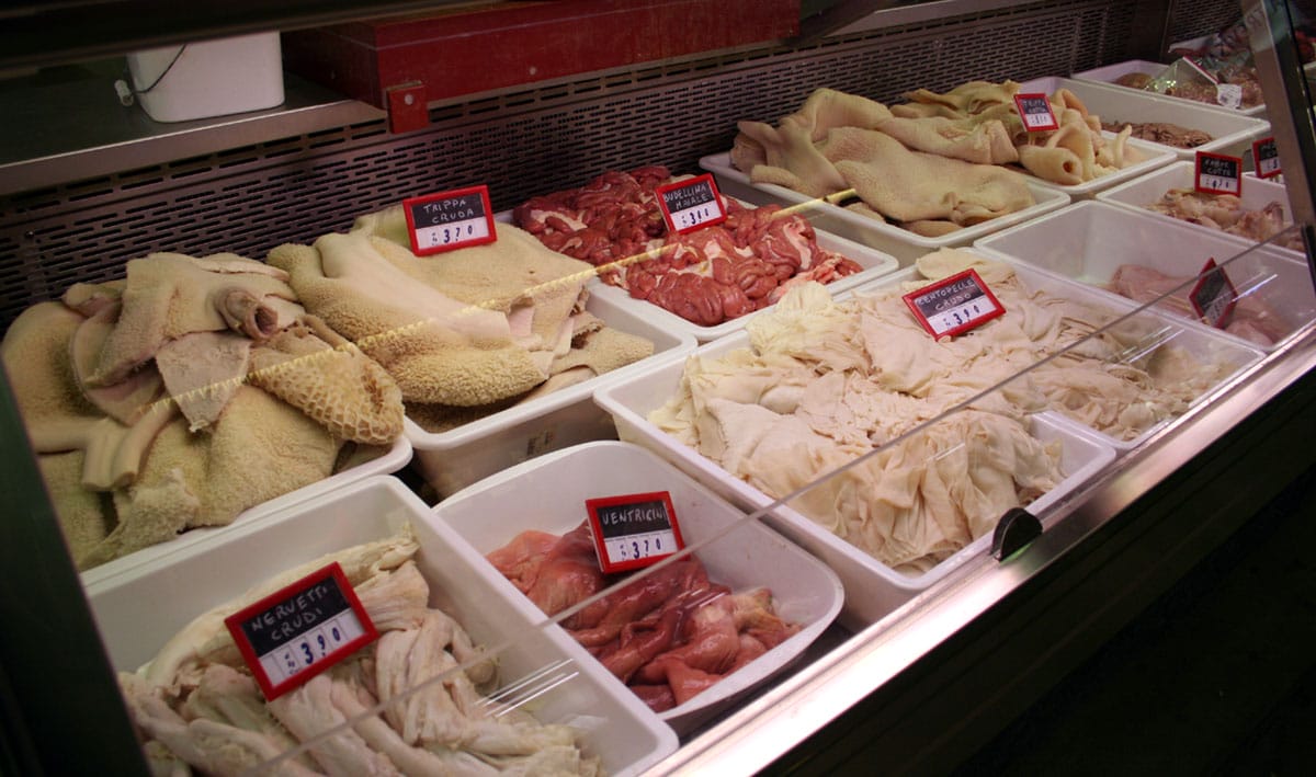 bins of offal at a Roman butcher shop.