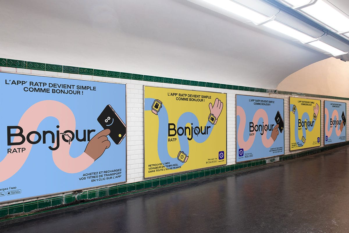 large billboards advertising for the RATP app in a Paris subway station.