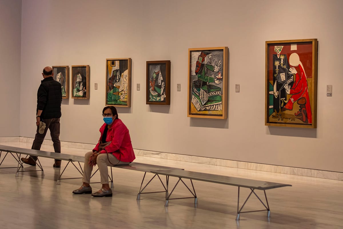 people walking through the Picasso Museum.