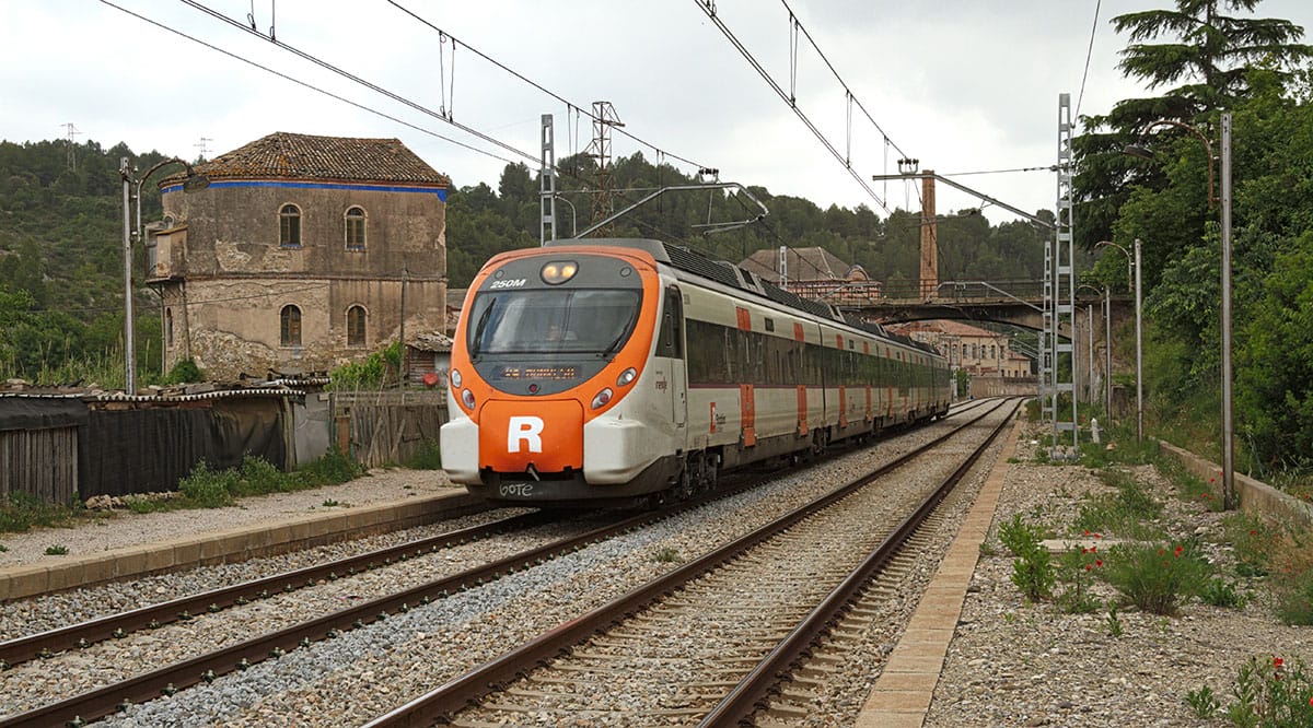 high speed train on at a small station in Catalonia.