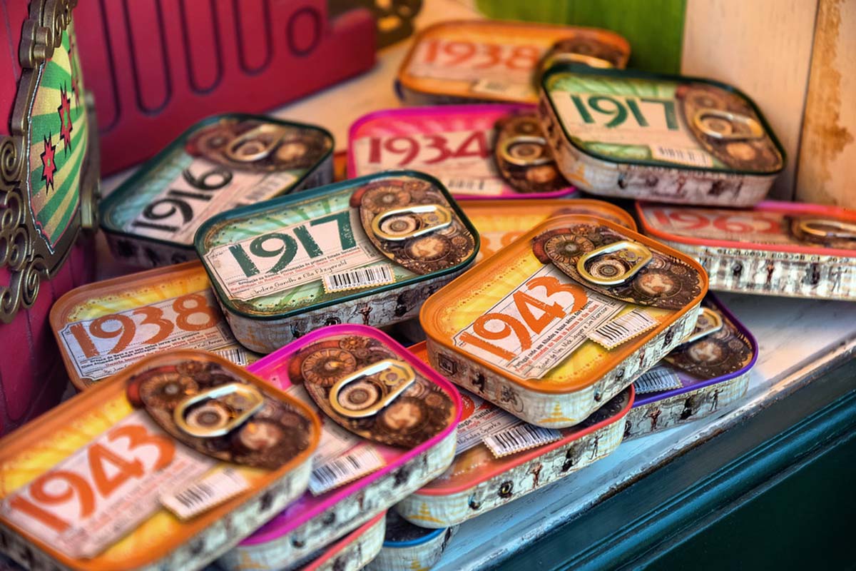 stack of colorful cans of sardines.