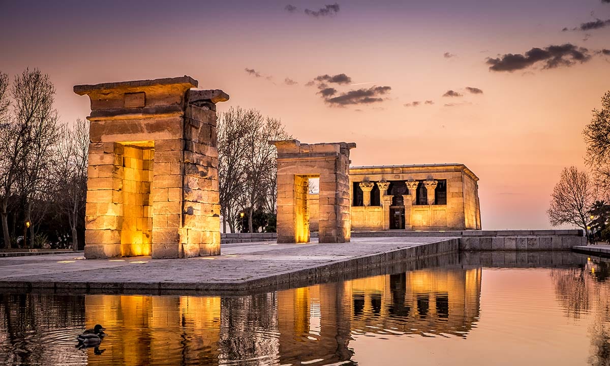 Egyptian style temple illuminated at sunset.