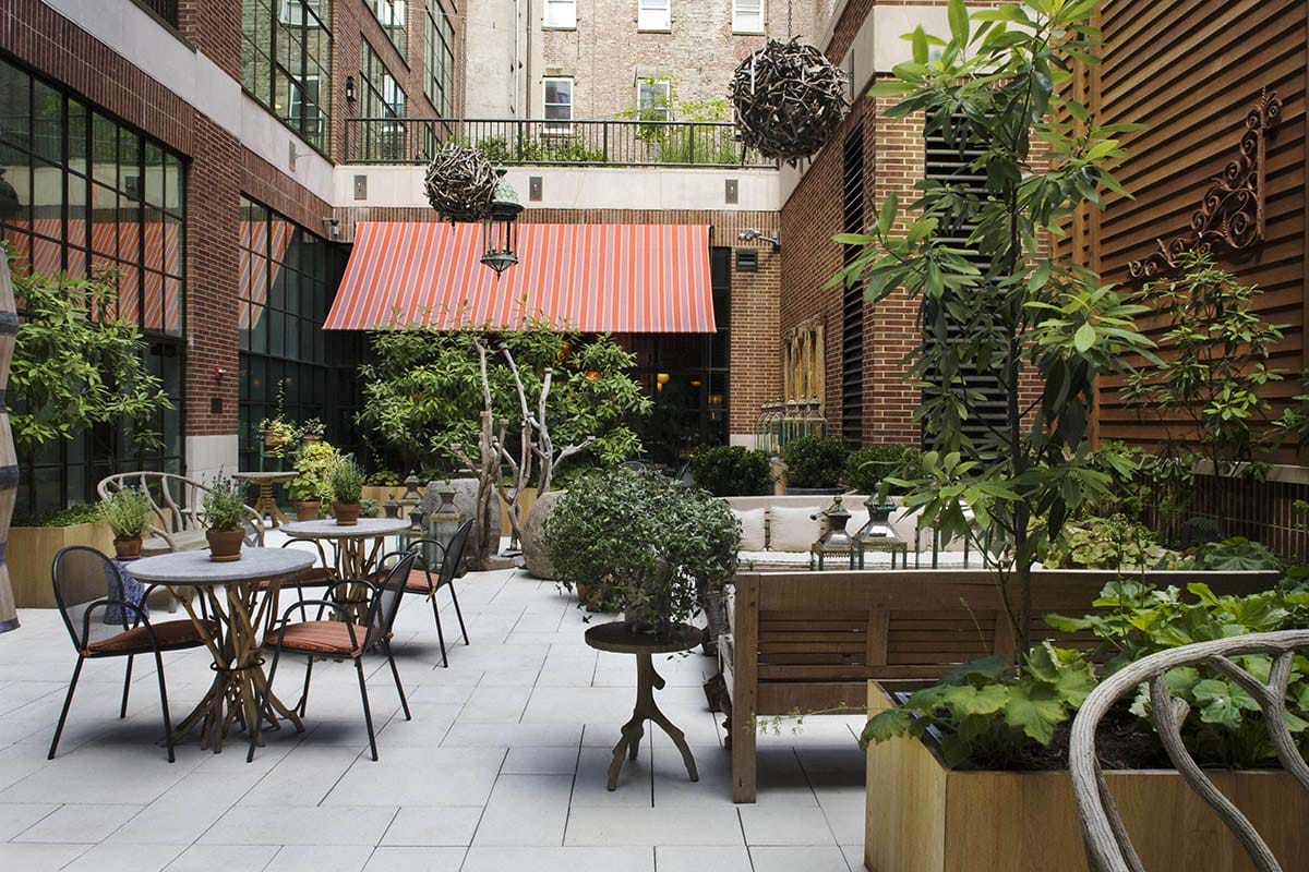 outdoor seating area with plants.